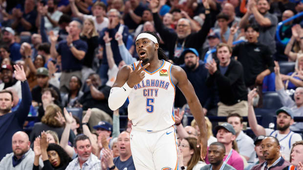Mar 14, 2024; Oklahoma City, Oklahoma, USA; Oklahoma City Thunder guard Luguentz Dort (5) gestures after scoring a three point basket against the Dallas Mavericks during the second half at Paycom Center.